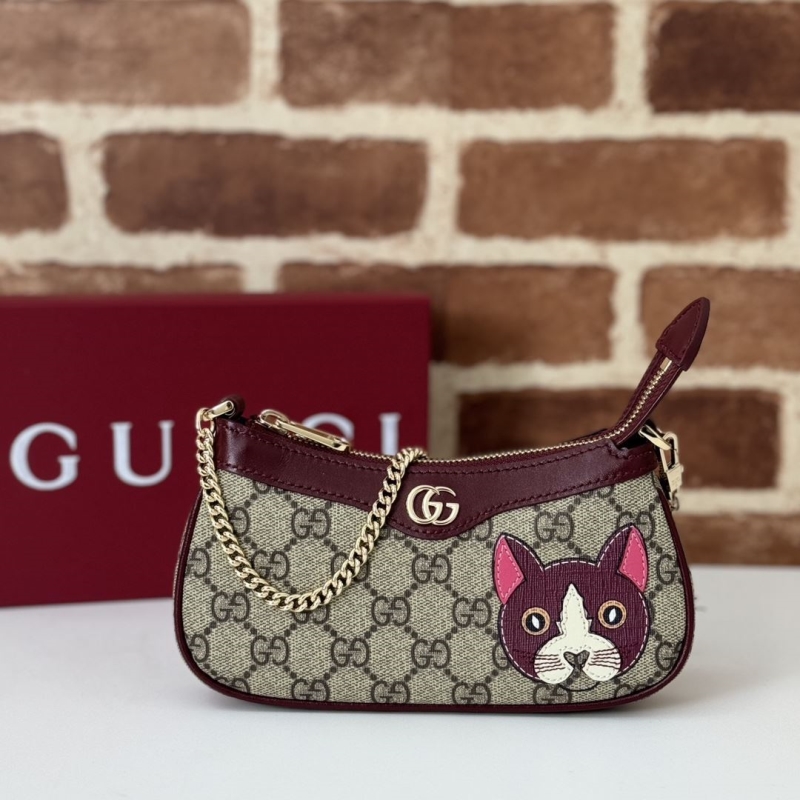G*u*i top handle bags